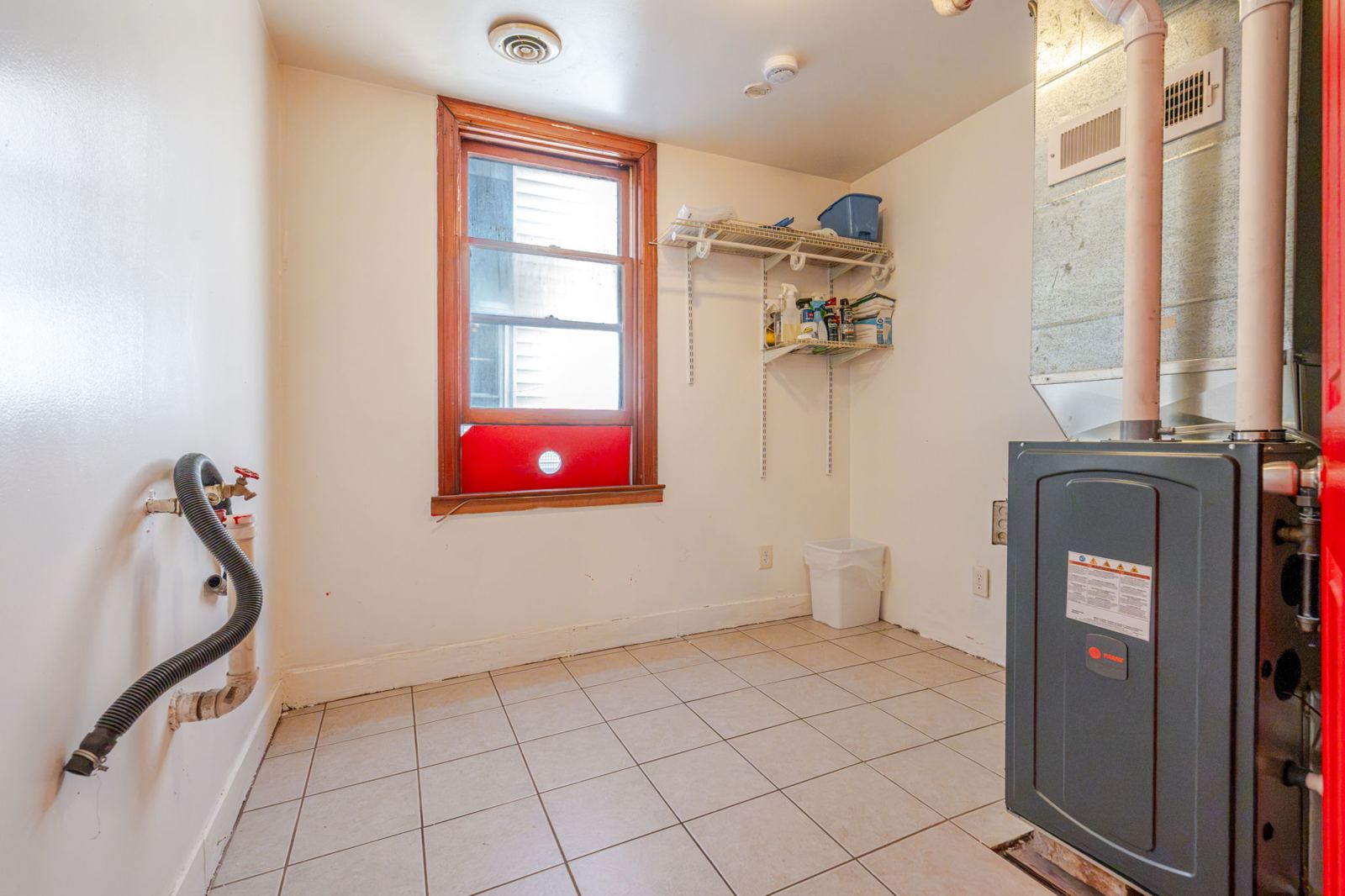 Utility room with the furnace and laundry hookups