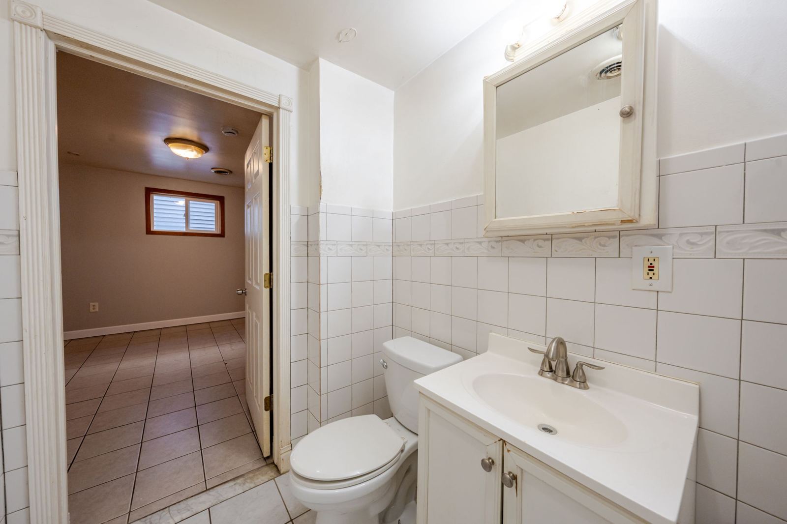 Bathroom with the vanity and toilet