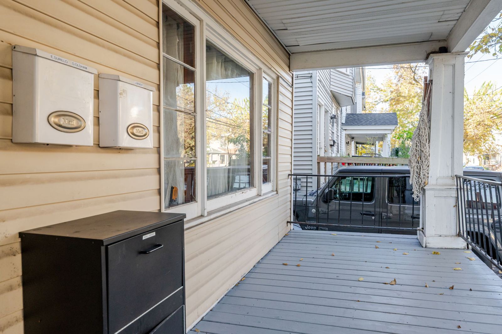 Covered porch beside the front windows